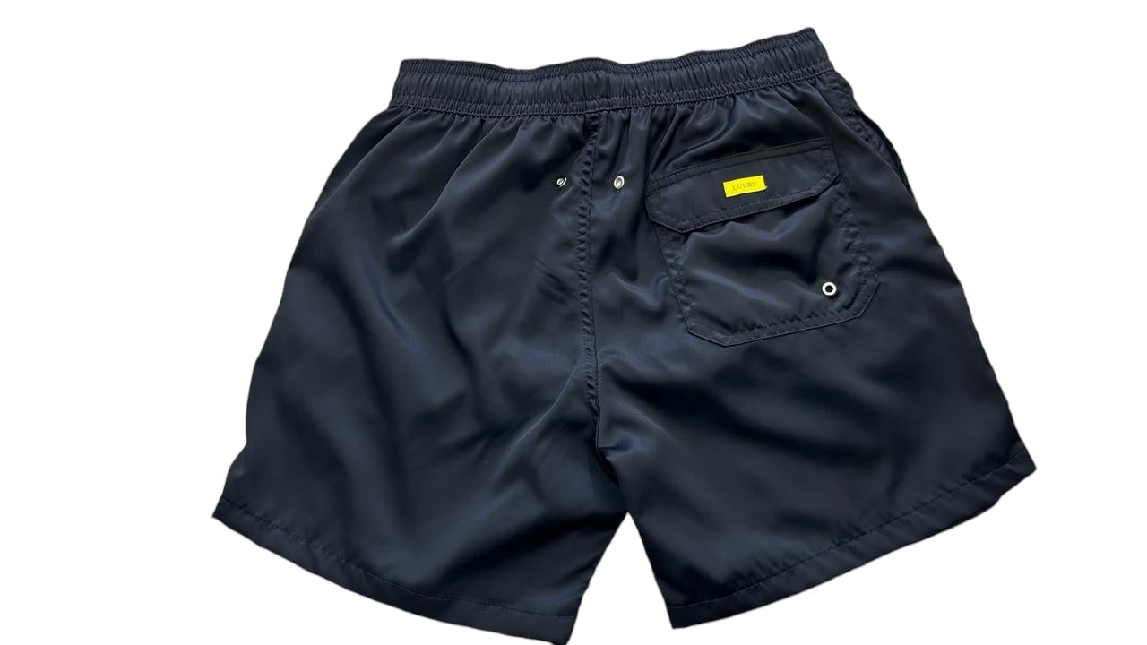 Trajes de Baño corto para hombre estilo volley en la arena
Volley swim shorts for men on the sand