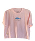 100% Pima cotton women’s crop top with a small fish illustration on the chest. Ultra-soft and lightweight, ideal for effortless, everyday wear with a coastal twist.
Crop top de mujer en algodón Pima 100%, con un pequeño dibujo de pez en el pecho. Súper suave y liviana, perfecta para un look relajado con inspiración costera.